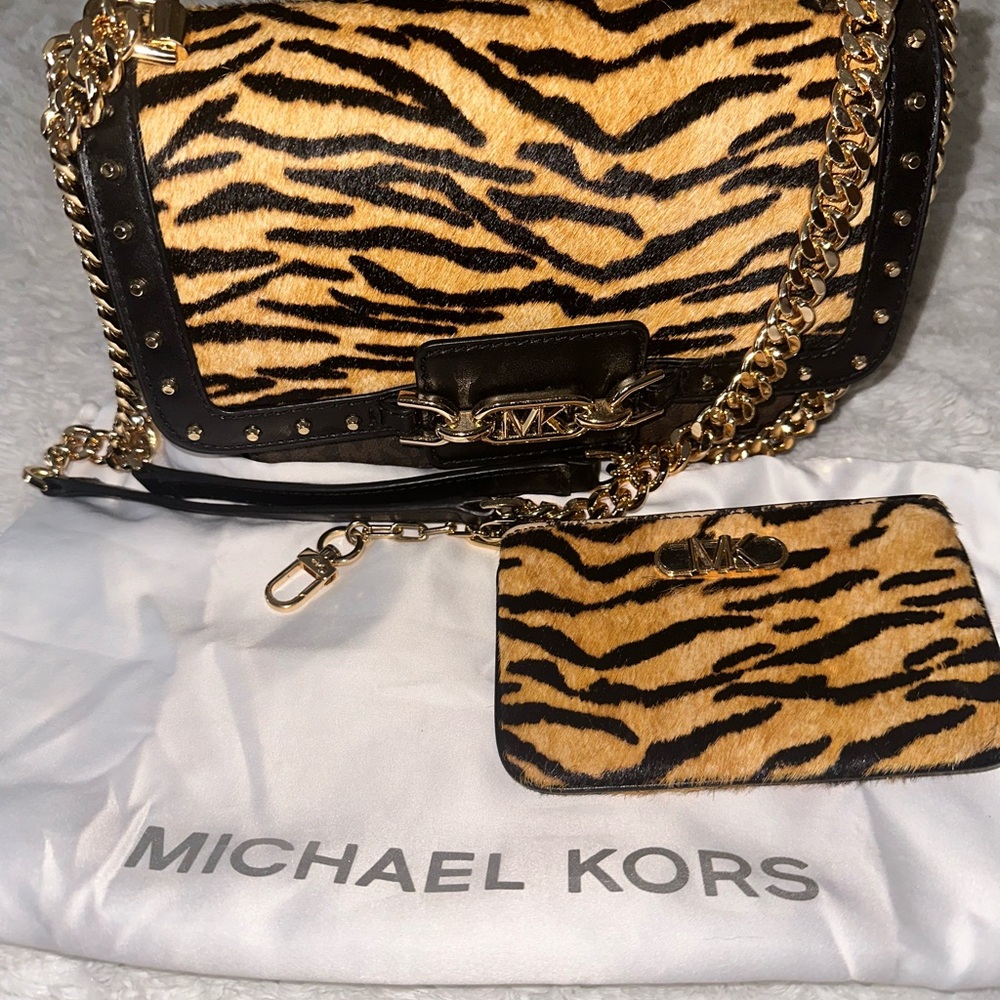 Michael Kors brown leather and gold with tiger felt print along with cc purse.